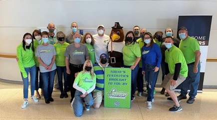 HEADstrong event whole team of workers posing in a group shot